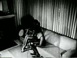 Black girls in 1960s spanking-bondage S&M fetish stag film snapshot 1