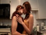 Lesbian seduction in kitchen with redhead and big tits snapshot 2