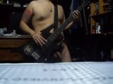 naked bass playing snapshot 2
