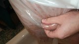 Peeling in my PVC Suit snapshot 5