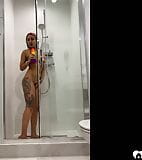 Tattooed teen gril fucking her sex toy in the shower snapshot 10