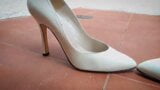 Dangling white pumps. P 1 snapshot 1