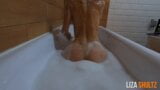 Fit teen plays in bubble bath. snapshot 2