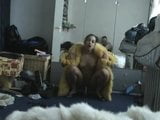 Girl in fur coat posing and masurbating snapshot 3