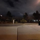 Streaking a street at night under a full moon snapshot 2