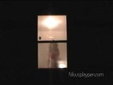 Voyeur Peeping Tom thru a friends window snapshot 3