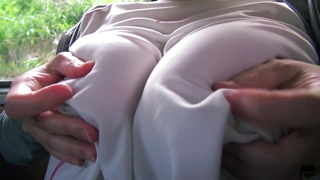 Sweaty older Japanese woman with massive tits uses them on my feet