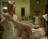 Lesbian Nurses Seduction In White Stocking snapshot 3