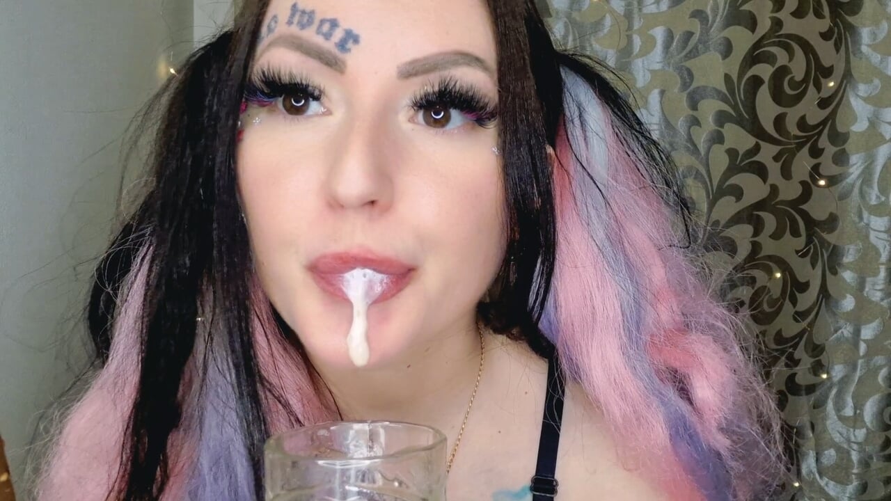 Dominatrix Nika spits into a glass