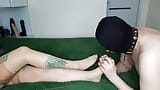 Foot fetish. Dominatrix Nika and her submissive foot slave. Massaging and licking feet, sucking toes snapshot 3