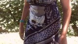 Nicoletta wears a large diaper in a public garden snapshot 1