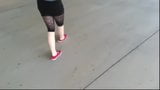 Girlfriend has to pee and wets her Leggings on parking deck snapshot 3