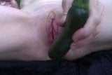 Tiny girl pushes zucchini into tight little pussy, so hot! snapshot 3