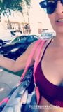 WWE Diva Nikki Bella walking after a workout in a red top snapshot 5