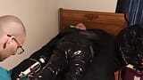 Jun 14 2022 - Rubber boy has a good time with the vibe in his leather straitjacket snapshot 4