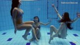 Three girls with Matrosova in swimming pools snapshot 1