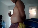 Cute Latino enjoys his new belly snapshot 5