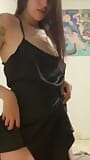 Stepsister in a satin black dress sexy dancing and playing with nipples, causing me desire. snapshot 2