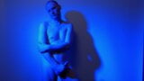 Kudoslong nude in a blue light playing with his flaccid cock snapshot 12