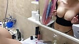 Joven esposa muestra a su vecina sus grandes tetas y coño en el baño snapshot 5