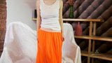 Stunning hairy Claire in orange skirt strps and masturbates snapshot 4