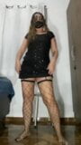 Hot little bitch strip dancing in a little black dress, fishnet overalls and black panties gets it in her big ass snapshot 8