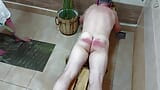 Femdom spanking husband with willow rods in the bath snapshot 4