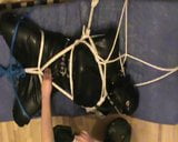 Boot to face - restrained rubberslave in the hogsack snapshot 4