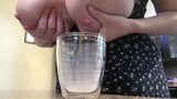 Big tits filling cup with milk snapshot 6