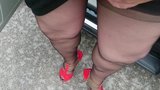 Outside in nylons and high heels snapshot 9