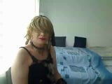 Transexual milf cachonda con un vestido corto y toques de tacones altos y caricias delante de la cámara snapshot 1