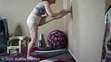 Doing yoga in panties doing a wall stretch for hamstrings snapshot 14