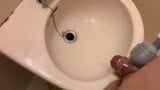 Small Penis With A Vibrator Sleeve Cumming And Pissing On Sink snapshot 4