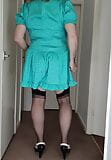 Caged sissy crossdresser parading in stockings. snapshot 1