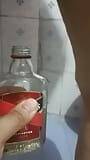 Bhabi pissing in rum bottle snapshot 10