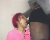 Redhead 18 year old ebony babe uses her throat on my cock. snapshot 1