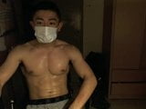Веб-камера азіатського спортсмена в масці snapshot 15