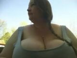 Fat Woman masturbates outdoors snapshot 1