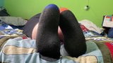 Chubby boy relaxes his sweaty socked feet snapshot 6