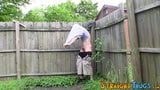 Tattooed hooligan jerks off in the backyard and jizzes solo snapshot 4