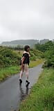 Crossdressing slut Maid on a public lane in the rain snapshot 2