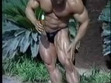 Bodybuilder oiling himself snapshot 5