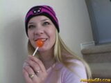 Blonde teen seductively sucks on lollipop snapshot 3