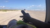 jerking off at the beach in a thong as vehicles pass by snapshot 9