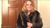 Blonde in fur coat posing snapshot 1