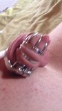 Enjoying dildo while locked in metal chastity cage snapshot 3