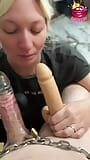 POV Blonde milf gives teasing blowjob inside a transparent cock sleeve snapshot 1