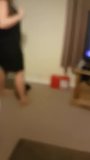 Slipping on her black high heels snapshot 2