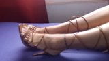 Very feminine strappy sandals wrapped around nice legs. snapshot 10