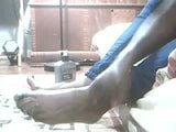 Rubbing lotion on my feet snapshot 5